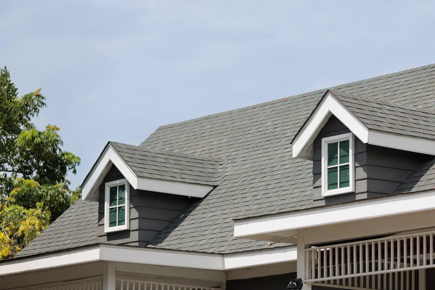 Roof shingles with garret house